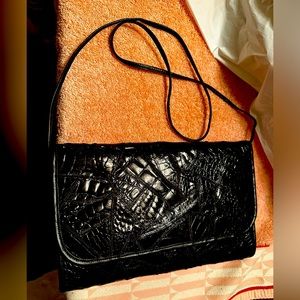 Black leather clutch